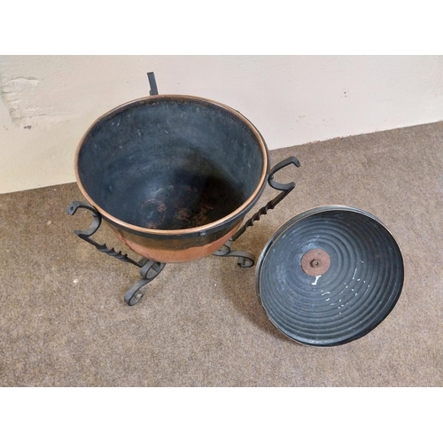 257 - 19th C. copper lidded coal bucket raised on metal stand {54 cm H x 40 cm Dia.}.