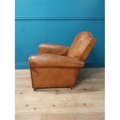 26 - French Art Deco tanned leather club chair {80 cm H x 80 cm W x 80 cm D}.