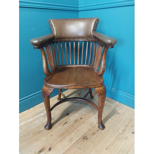 266 - 1940s oak and leather office chair raised on cabriole legs {87 cm H x 60 cm W x 60 cm D}.