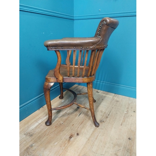 266 - 1940s oak and leather office chair raised on cabriole legs {87 cm H x 60 cm W x 60 cm D}.