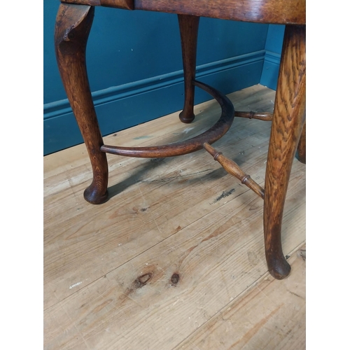 266 - 1940s oak and leather office chair raised on cabriole legs {87 cm H x 60 cm W x 60 cm D}.