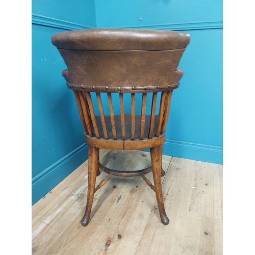 266 - 1940s oak and leather office chair raised on cabriole legs {87 cm H x 60 cm W x 60 cm D}.