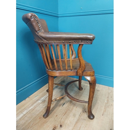 266 - 1940s oak and leather office chair raised on cabriole legs {87 cm H x 60 cm W x 60 cm D}.