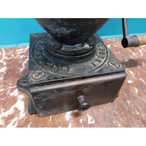 269 - Early 20th C. cast iron coffee grinder. {36 cm H x  36 cm W x 23 cm D}.