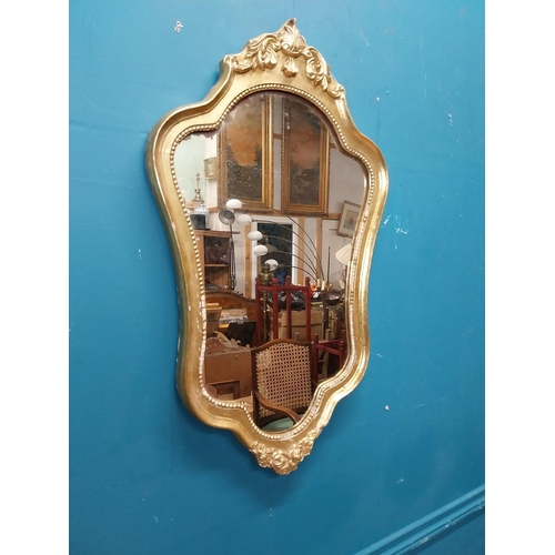 272 - French gilt and carved wall mirror in the Victorian style. {68 cm H x 40 cm W}.