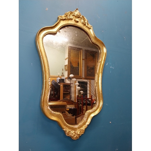 272 - French gilt and carved wall mirror in the Victorian style. {68 cm H x 40 cm W}.