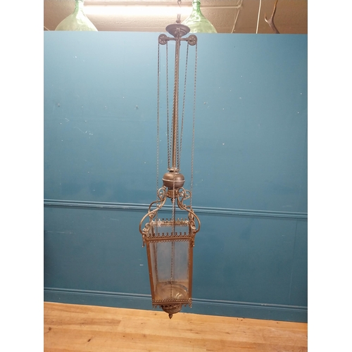 277 - 19th C. brass hall lanterns with glazed panels {140 cm H x 30 cm W x 30 cm D}.