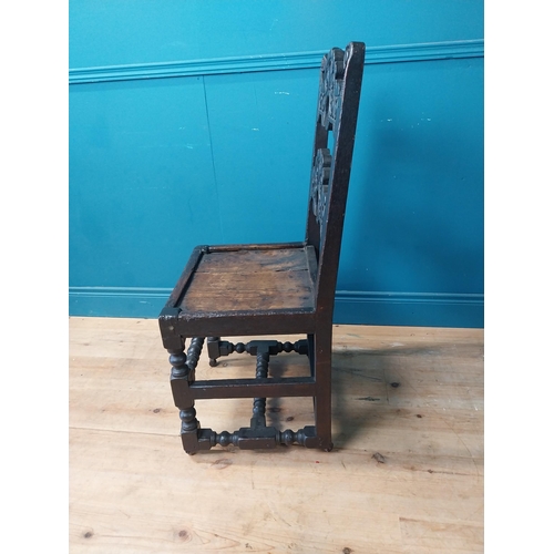 278 - 18th C. carved oak side chair raised on turned legs {100 cm H x 46 cm W x 40 cm D }.