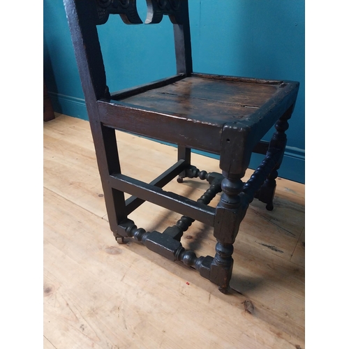 278 - 18th C. carved oak side chair raised on turned legs {100 cm H x 46 cm W x 40 cm D }.