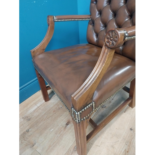 30 - Mahogany and leather Gainsborough chair in the Georgian style {100 cm H x 70 cm W x 65 cm D}.