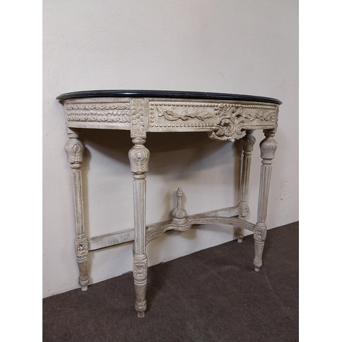 32 - Decorative painted pine side table with marble top in the French style {84 cm H x 106 cm W x 42 cm D... 