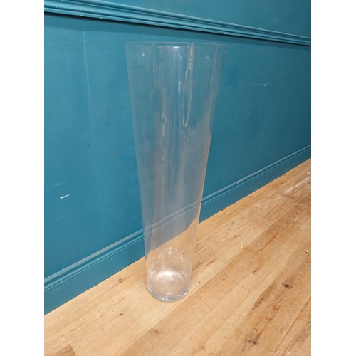 39 - Large glass flower vase {90 cm H x 28 cm Dia.}.