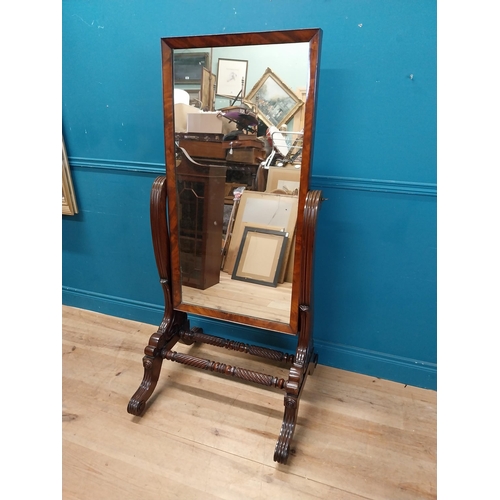 47 - Exceptional quality Regency mahogany cheval mirror raised on barley twist supports and four outswept... 