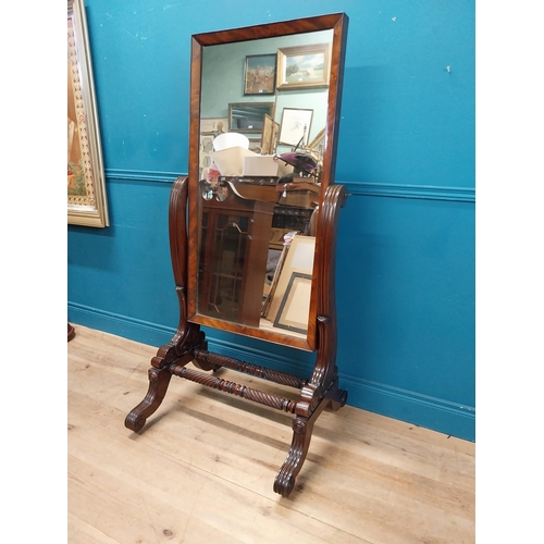 47 - Exceptional quality Regency mahogany cheval mirror raised on barley twist supports and four outswept... 