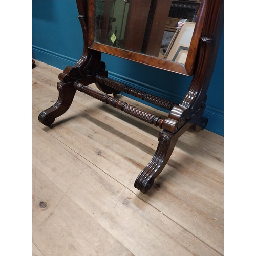 47 - Exceptional quality Regency mahogany cheval mirror raised on barley twist supports and four outswept... 