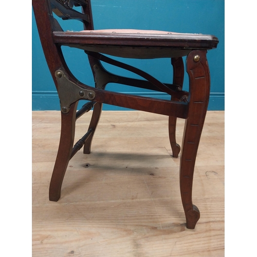 52 - Edwardian mahogany and upholstered campaign chair {83 cm H x 40 cm W x 40 cm D}.