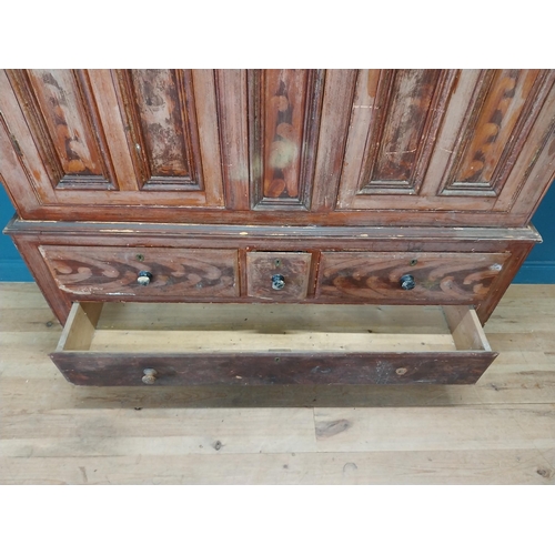 562 - 19th. C. Irish scumbled pine harness cupboard County Antrim, the two long doors each with four inver... 