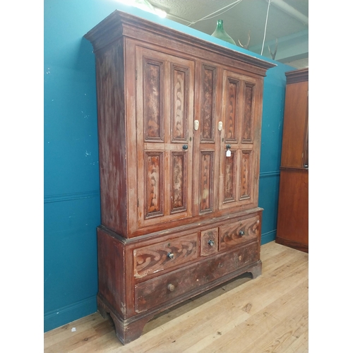 562 - 19th. C. Irish scumbled pine harness cupboard County Antrim, the two long doors each with four inver... 