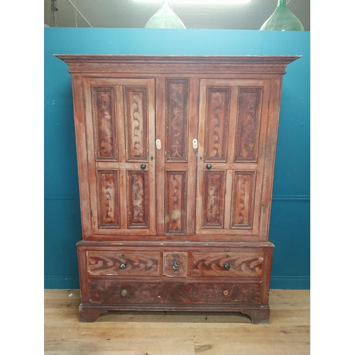 562 - 19th. C. Irish scumbled pine harness cupboard County Antrim, the two long doors each with four inver... 