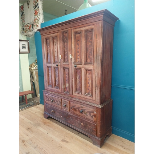 562 - 19th. C. Irish scumbled pine harness cupboard County Antrim, the two long doors each with four inver... 
