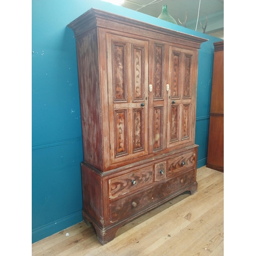 562 - 19th. C. Irish scumbled pine harness cupboard County Antrim, the two long doors each with four inver... 