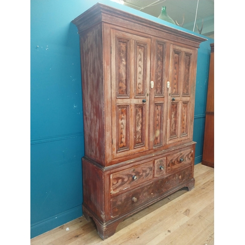 562 - 19th. C. Irish scumbled pine harness cupboard County Antrim, the two long doors each with four inver... 