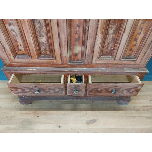 562 - 19th. C. Irish scumbled pine harness cupboard County Antrim, the two long doors each with four inver... 