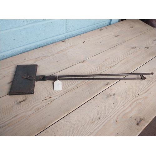 564 - Early 20th. C.  Wrought iron waffering iron  { 69cm H X 18cm W }.