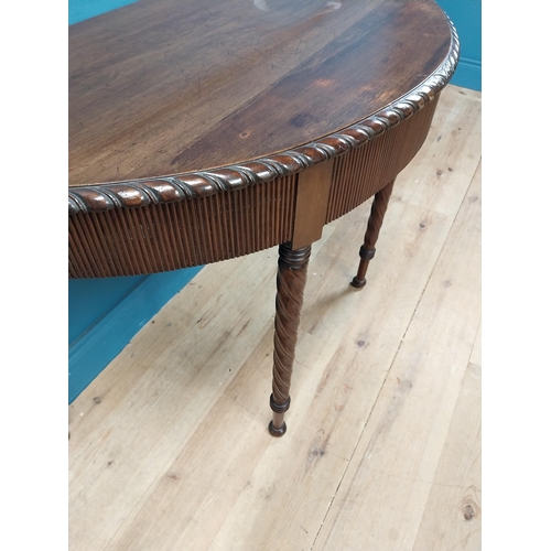 59 - Regency mahogany demi-lune side table with reeded apron raised on barley twist legs {77 cm H x 125 c... 