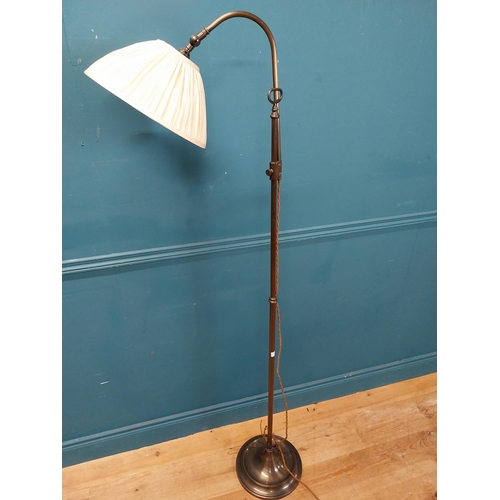 64 - Good quality bronzed metal standard lamp with cloth shade {170 cm H x 54 cm W x 30 cm D}.