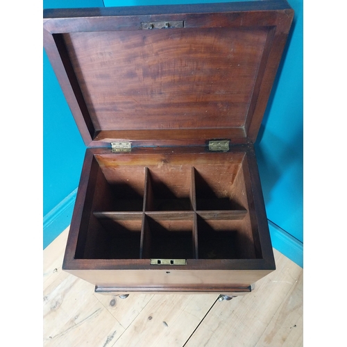 68 - Georgian mahogany cellarette raised on turned legs and castors {63 cm H x 49 cm W x 23 cm D}.