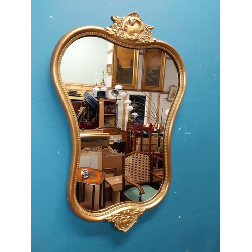 72 - Gilt and carved wall mirror in the Victorian style. {69 cm H x 47 cm W}