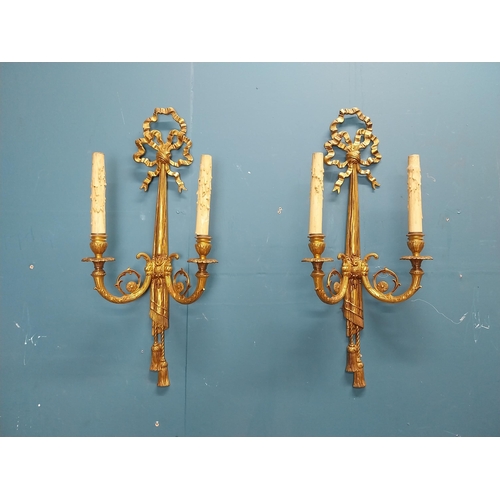 75 - Pair of good quality gilded bronze wall lights in the Empire style {60 cm H x 28 cm W x 13 cm D}.