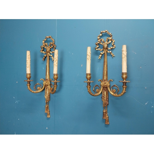 75 - Pair of good quality gilded bronze wall lights in the Empire style {60 cm H x 28 cm W x 13 cm D}.