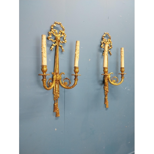 75 - Pair of good quality gilded bronze wall lights in the Empire style {60 cm H x 28 cm W x 13 cm D}.