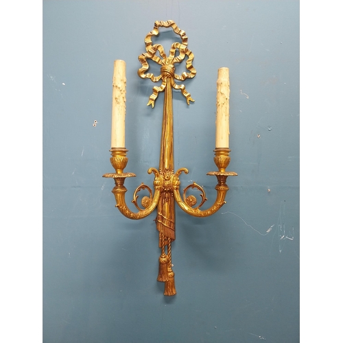 75 - Pair of good quality gilded bronze wall lights in the Empire style {60 cm H x 28 cm W x 13 cm D}.