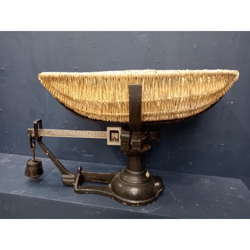 760 - Set of 19th. C. metal baby weighing scales with wicker basket. { 42cm H X 70cm W 33cm D }.