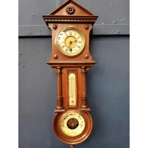 767 - Wurttemberg clock - barometer with enamel dials. { 65cm H X 22cm W X 11cm D }.