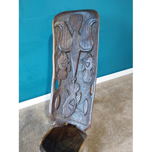 768 - Carved hardwood birthing chair { 110cm H X 36cm W X 60cm D }. { cm H  cm W cm D}.