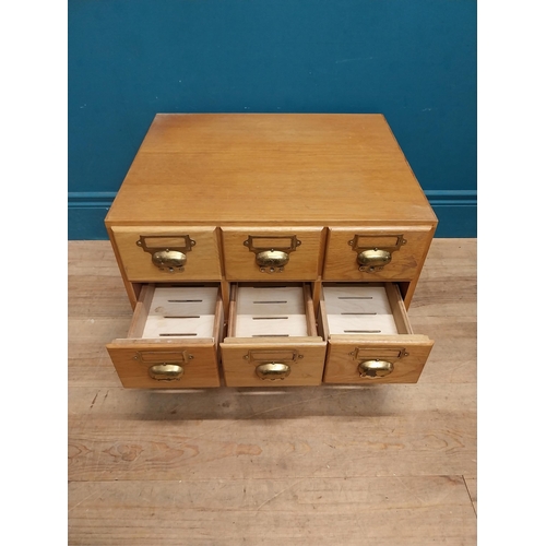 81 - 1940's oak desk top bank of drawers with original brass handles. {36 cm H x 50 cm W x 43 cm D}.