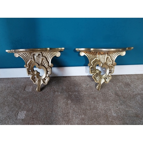 849 - Pair of giltwood wall sconces. {44 cm H x 46 cm W x 27 cm D}.{ cm H  cm W cm D}.