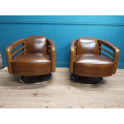 85 - Pair exceptional quality cherrywood and hand died leather swivel arm chairs on chrome bases in the M... 