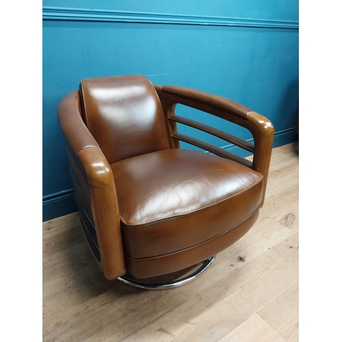 85 - Pair exceptional quality cherrywood and hand died leather swivel arm chairs on chrome bases in the M... 