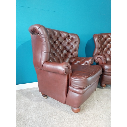 851 - Pair of deep buttoned leather wingback armchairs{109 cm H 98 cm W 76cm D}.