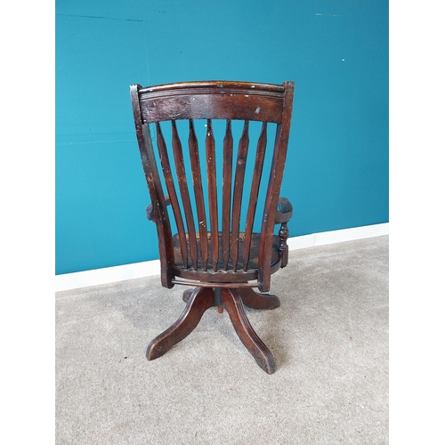 855 - 1940s bentwood swivel office arm chair{100 cm H 55 cm W 55cm D}.