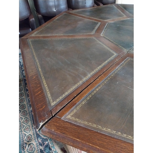 883 - 19th C. oak octagonal rent table with inset leather top raised on square reeded legs. Provenance fro... 