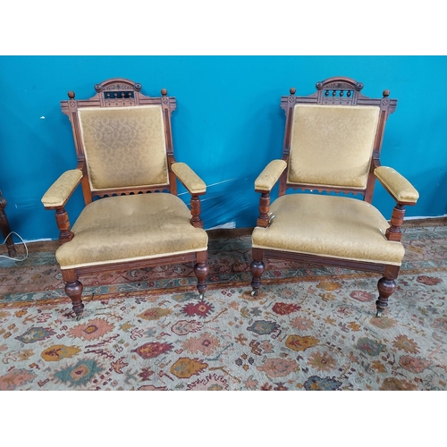 885 - Pair of Edwardian upholstered mahogany open armchairs raised on turned legs { 97cm H X 65cm W X 64cm... 