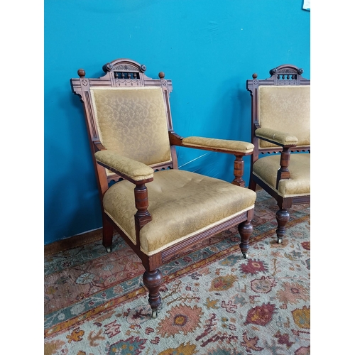 885 - Pair of Edwardian upholstered mahogany open armchairs raised on turned legs { 97cm H X 65cm W X 64cm... 