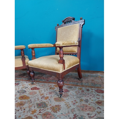 885 - Pair of Edwardian upholstered mahogany open armchairs raised on turned legs { 97cm H X 65cm W X 64cm... 