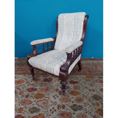 892 - 19th. C. Upholstered mahogany open armchair raised on tapered reeded legs, in need of some repairs {... 